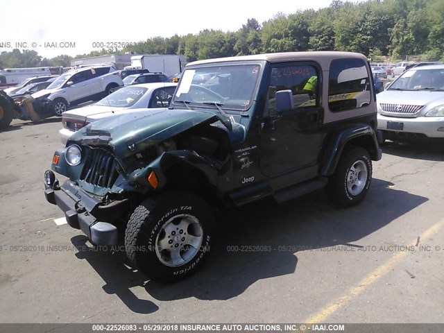 1J4FA59S0YP700798 - 2000 JEEP WRANGLER / TJ SAHARA GREEN photo 2