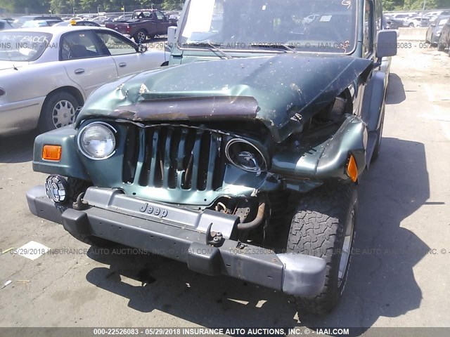 1J4FA59S0YP700798 - 2000 JEEP WRANGLER / TJ SAHARA GREEN photo 6