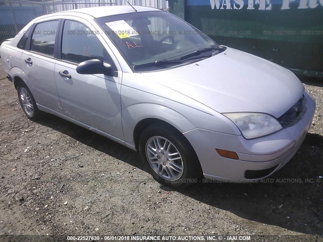 1FAFP34N17W166523 - 2007 FORD FOCUS ZX4/S/SE/SES SILVER photo 1