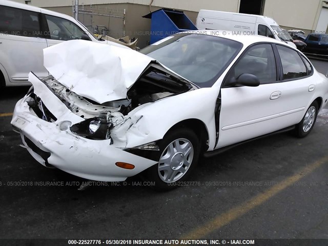 1FAFP52U6XG321339 - 1999 FORD TAURUS LX WHITE photo 2