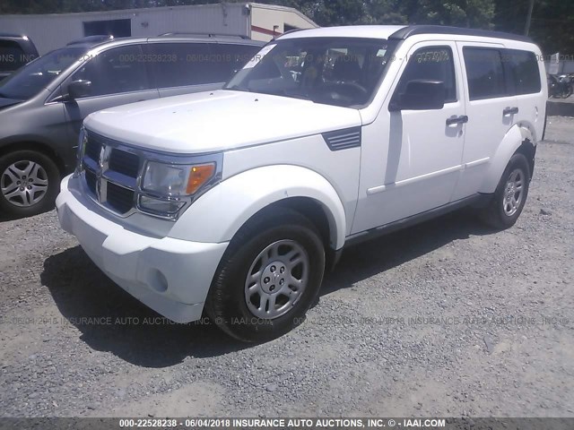 1D4PT2GKXBW518404 - 2011 DODGE NITRO SE WHITE photo 2