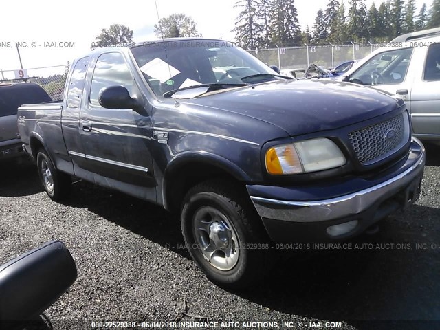 1FTRX18L6XKB32279 - 1999 FORD F150 ლურჯი ფოტო 1