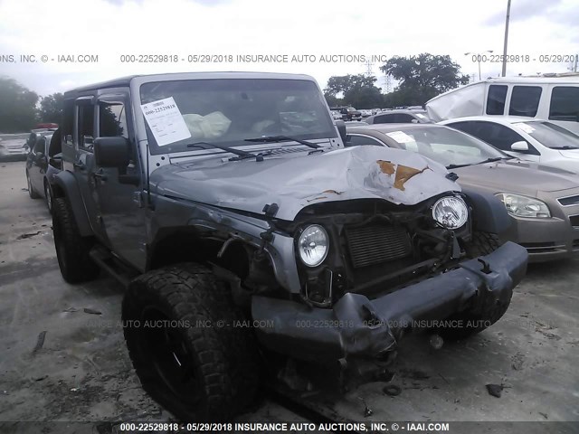 1C4BJWFG3GL204927 - 2016 JEEP WRANGLER UNLIMITE RUBICON SILVER photo 1