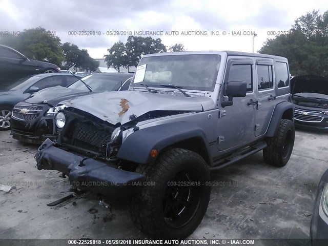 1C4BJWFG3GL204927 - 2016 JEEP WRANGLER UNLIMITE RUBICON SILVER photo 2