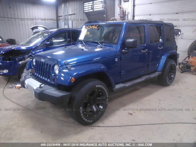 1J4GA59149L787660 - 2009 JEEP WRANGLER UNLIMITE SAHARA BLUE photo 2