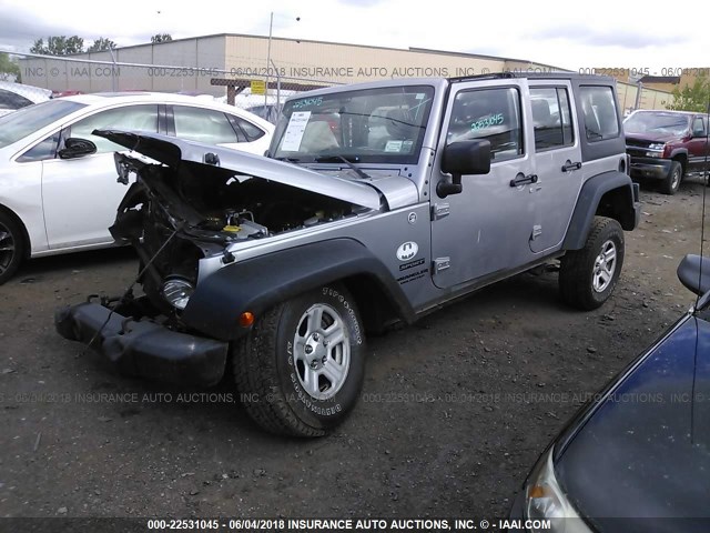 1C4BJWDG0EL290343 - 2014 JEEP WRANGLER UNLIMITE SPORT SILVER photo 2