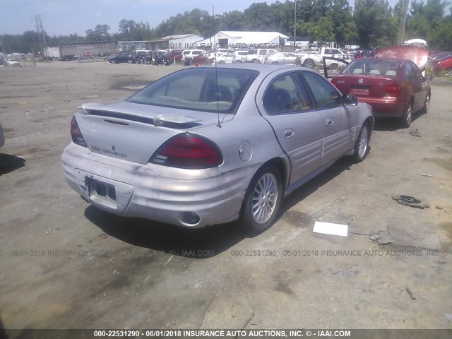 1G2NE52E1XC581387 - 1999 PONTIAC GRAND AM SE SILVER photo 4