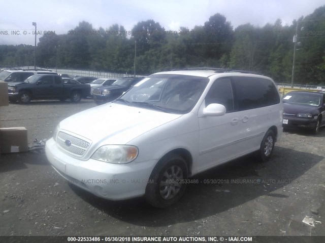 KNDUP131146538099 - 2004 KIA SEDONA EX/LX WHITE photo 2