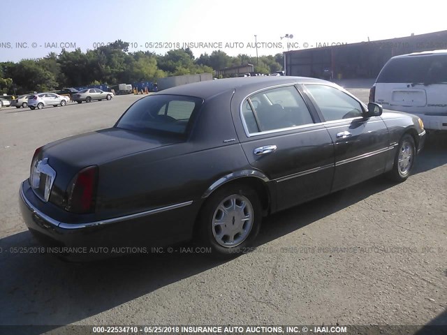 1LNHM82W62Y658347 - 2002 LINCOLN TOWN CAR SIGNATURE BLACK photo 4