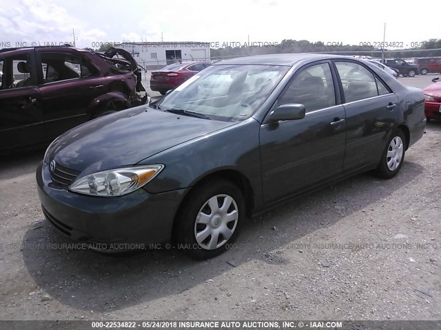 4T1BE32KX3U689743 - 2003 TOYOTA CAMRY LE/XLE/SE მწვანე ფოტო 2