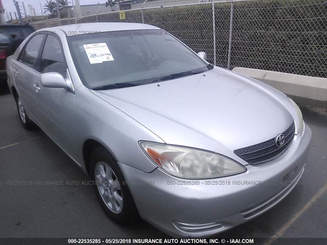 JTDBF32K940157488 - 2004 TOYOTA CAMRY LE/XLE SILVER photo 1