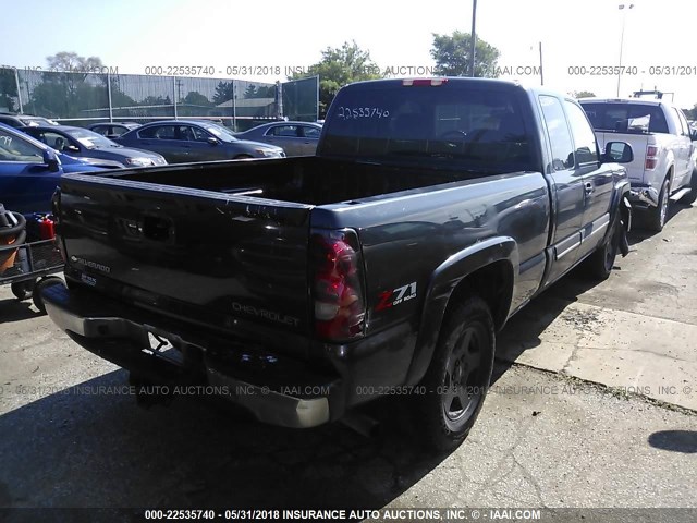 1GCEK19B25Z145814 - 2005 CHEVROLET SILVERADO K1500 BLACK photo 4