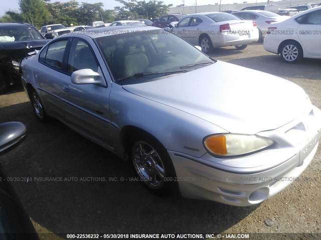 1G2NW52E42M571646 - 2002 PONTIAC GRAND AM GT GRAY photo 1