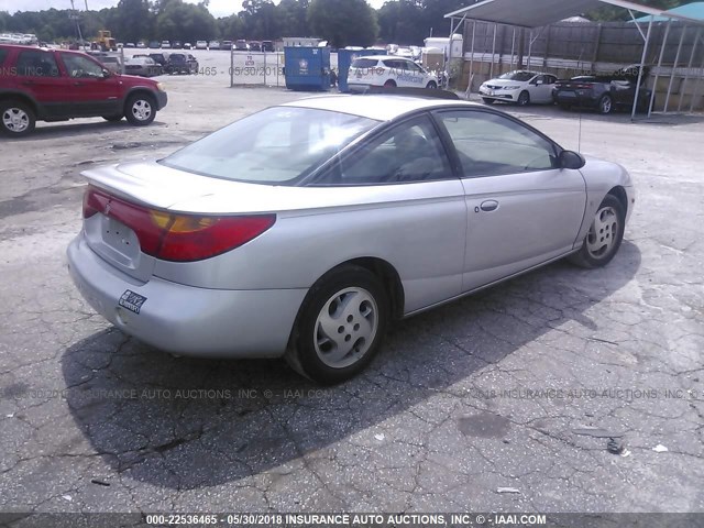 1G8ZY12752Z134009 - 2002 SATURN SC2 SILVER photo 4