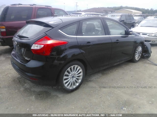 1FAHP3N29CL465217 - 2012 FORD FOCUS TITANIUM BLACK photo 4