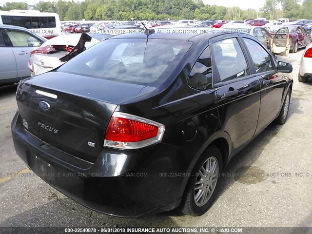 1FAHP3FN0BW121541 - 2011 FORD FOCUS SE BLACK photo 4