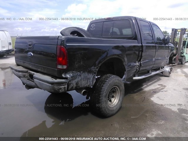 1FTSW31F32EC82460 - 2002 FORD F350 SRW SUPER DUTY BLACK photo 4