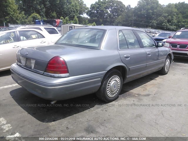 2FAFP73W6WX117970 - 1998 FORD CROWN VICTORIA  GRAY photo 4