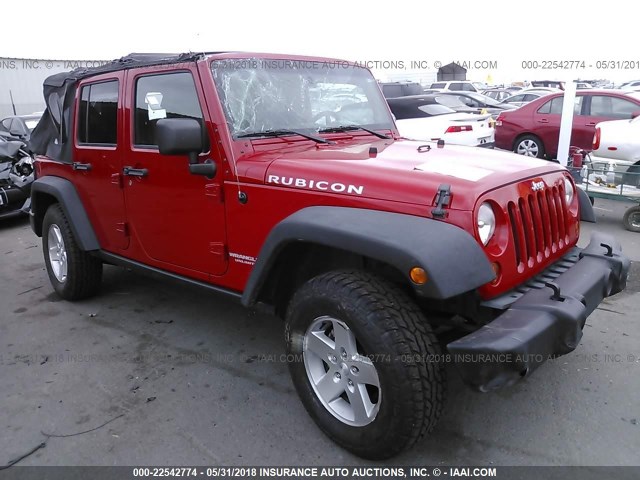 1J4BA6H19AL143559 - 2010 JEEP Wrangler Unlimited RUBICON RED photo 1