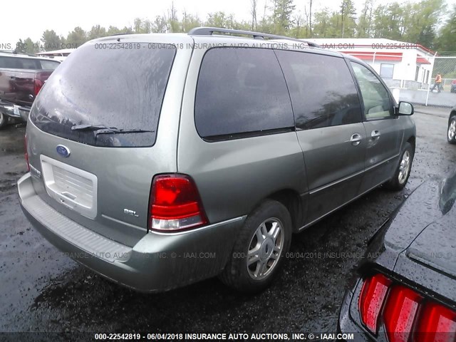 2FMDA52244BB15937 - 2004 FORD FREESTAR SEL GREEN photo 4