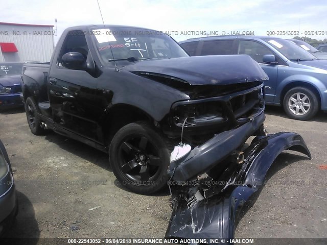 2FTZF07302CA86279 - 2002 FORD F150 SVT LIGHTNING BLACK photo 1