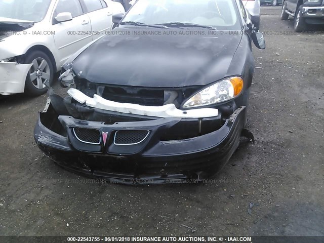 1G2NE52T5XM701250 - 1999 PONTIAC GRAND AM SE BLACK photo 6