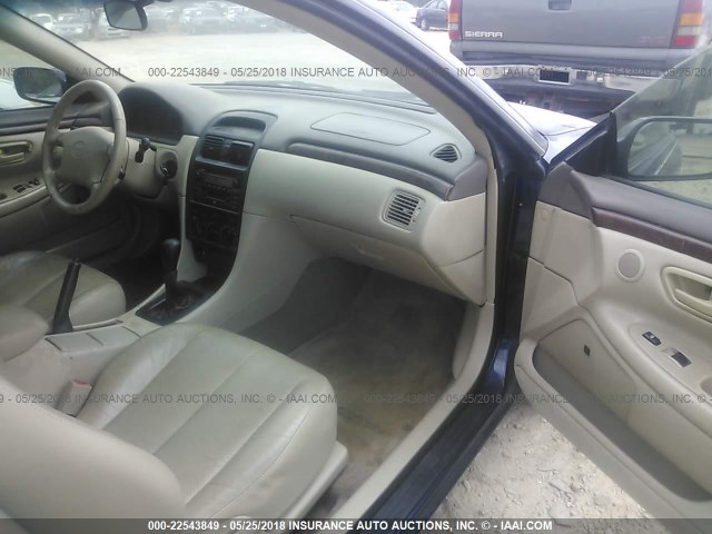 2T1CF22P11C465542 - 2001 TOYOTA CAMRY SOLARA SE/SLE შავი ფოტო 5