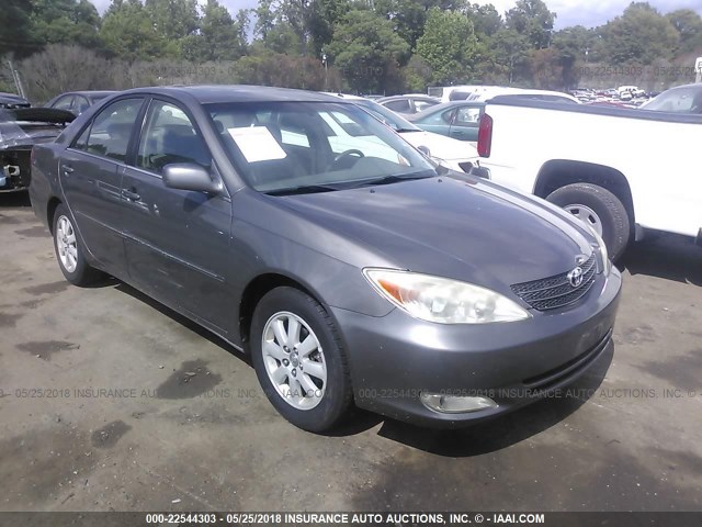 4T1BE30K03U709100 - 2003 TOYOTA CAMRY LE/XLE/SE ნაცრისფერი ფოტო 1