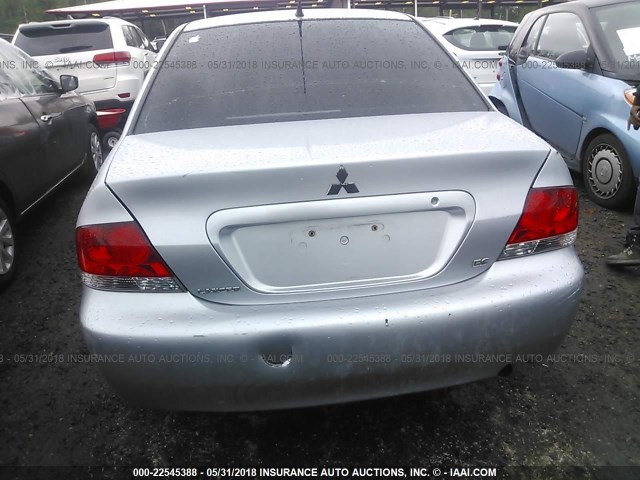 JA3AJ26E54U014831 - 2004 MITSUBISHI LANCER ES SILVER photo 6