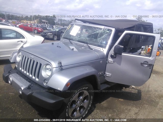 1C4AJWBG7GL110695 - 2016 JEEP WRANGLER SAHARA SILVER photo 2