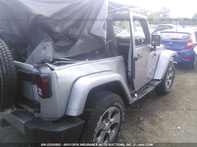 1C4AJWBG7GL110695 - 2016 JEEP WRANGLER SAHARA SILVER photo 6