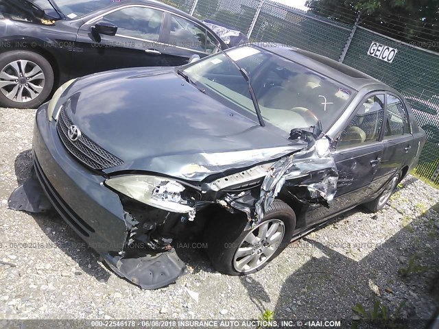 JTDBF30K230114614 - 2003 TOYOTA CAMRY LE/XLE 绿色 照片 2