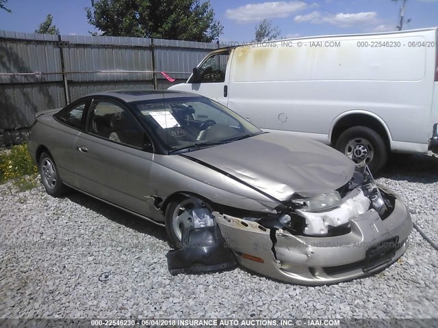 1G8ZY1274XZ339201 - 1999 SATURN SC2 GOLD photo 1