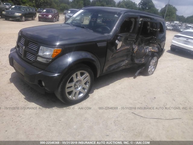 1D4PT4GK4BW563799 - 2011 DODGE NITRO HEAT GRAY photo 2