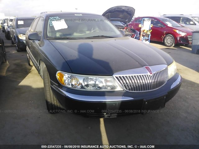 1LNHM97V12Y655684 - 2002 LINCOLN CONTINENTAL  GREEN photo 1