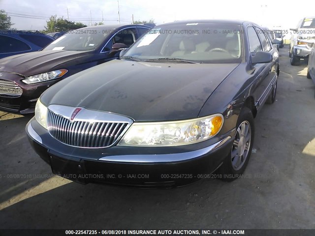 1LNHM97V12Y655684 - 2002 LINCOLN CONTINENTAL  GREEN photo 2