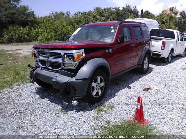 1D8GT28K77W662027 - 2007 DODGE NITRO SXT RED photo 2