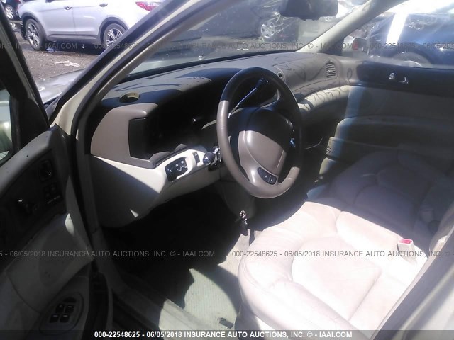 1LNLM97VXVY647369 - 1997 LINCOLN CONTINENTAL  金色 照片 5