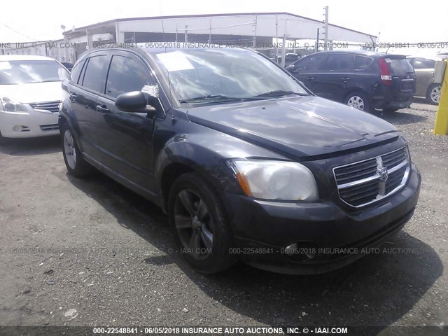 1B3CB3HA9BD124979 - 2011 DODGE CALIBER MAINSTREET BLACK photo 1