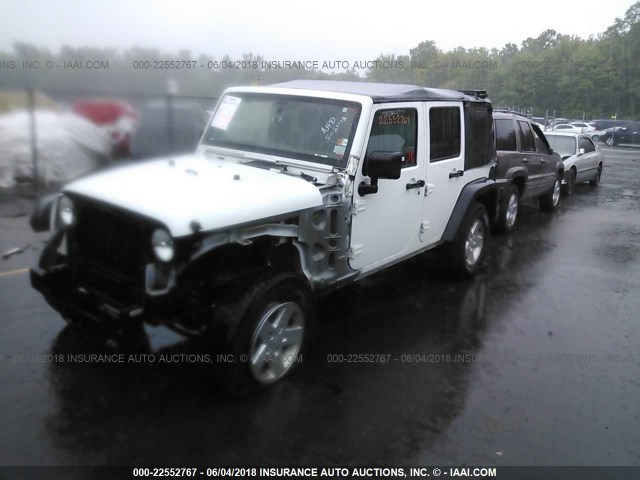 1J4HA3H15BL586205 - 2011 JEEP WRANGLER UNLIMITE SPORT WHITE photo 2