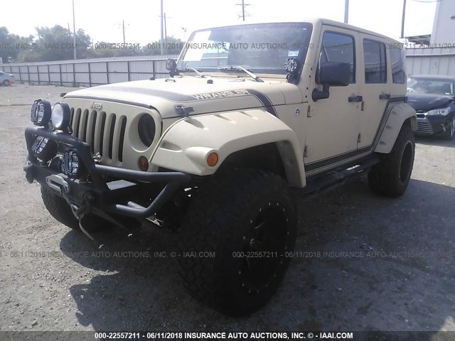 1C4BJWDG7DL557749 - 2013 JEEP WRANGLER UNLIMITE SPORT TAN photo 2