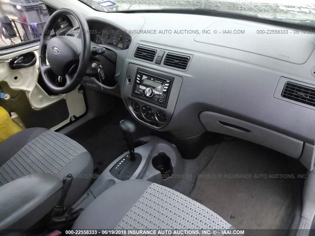 1FAFP34N85W250478 - 2005 FORD FOCUS ZX4 GRAY photo 5