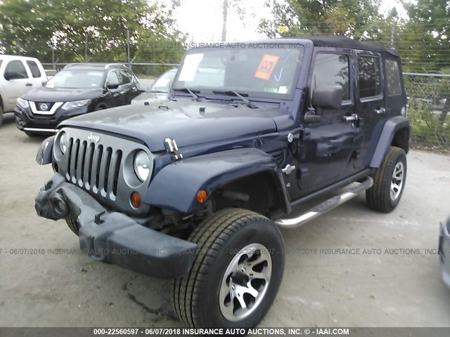 1C4BJWDG1DL580489 - 2013 JEEP WRANGLER UNLIMITE SPORT BLUE photo 2