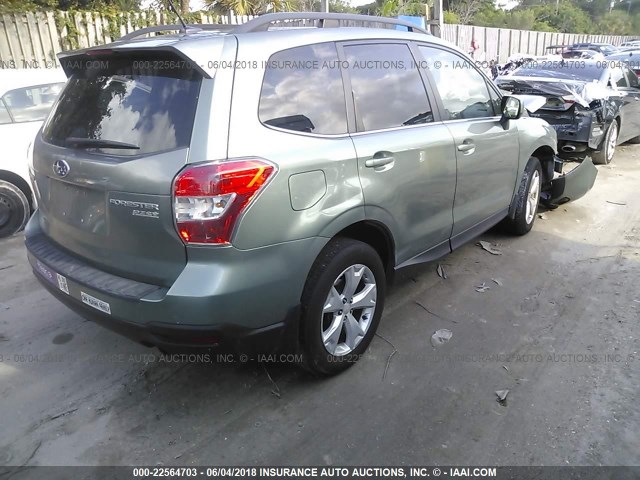 JF2SJAJC7EH425746 - 2014 SUBARU FORESTER 2.5I LIMITED GREEN photo 4