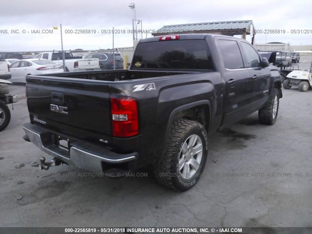 3GTU2UEC2FG172802 - 2015 GMC SIERRA K1500 SLE BLACK photo 4