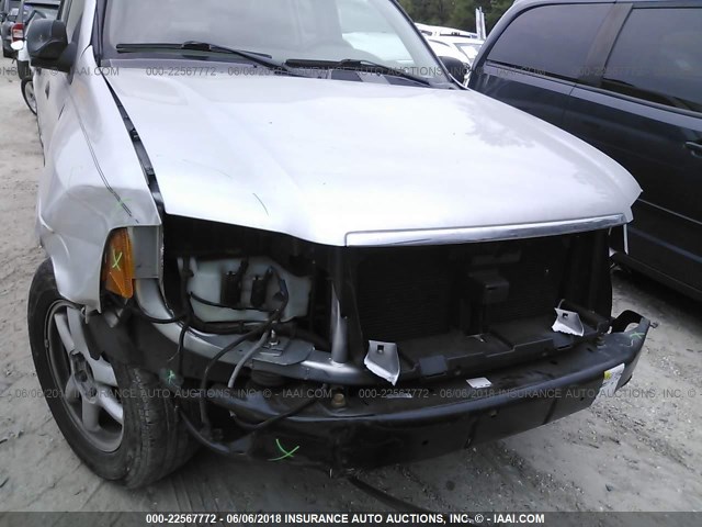 1GKDS13S242224030 - 2004 GMC ENVOY SILVER photo 6