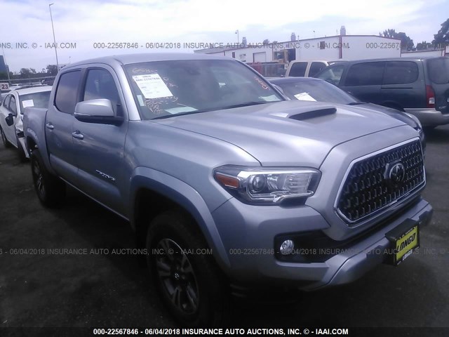 3TMCZ5AN0JM132491 - 2018 TOYOTA TACOMA DBL CAB/SR/TRDSPT/OR/PRO SILVER photo 1