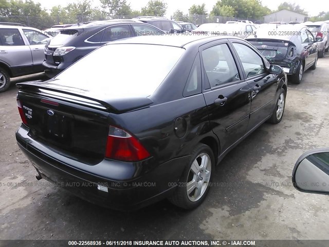 1FAHP34N87W333954 - 2007 FORD FOCUS ZX4/S/SE/SES BLACK photo 4