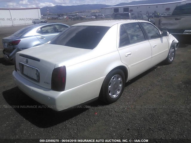 1G6KE57Y21U150644 - 2001 CADILLAC DEVILLE DHS WHITE photo 4