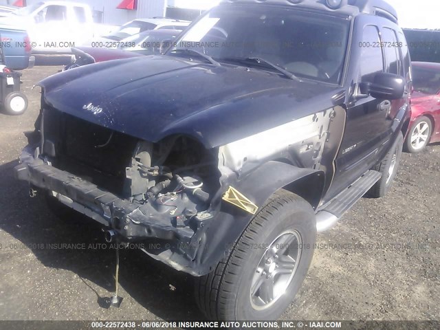 1J4GL38K23W657875 - 2003 JEEP LIBERTY RENEGADE BLACK photo 2